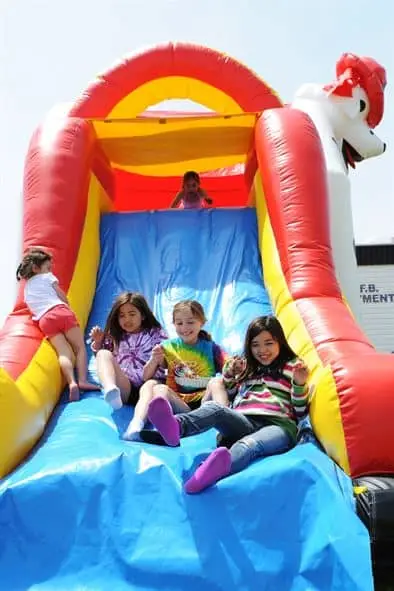 kids having fun on a dry slide after reading our Privacy Policy